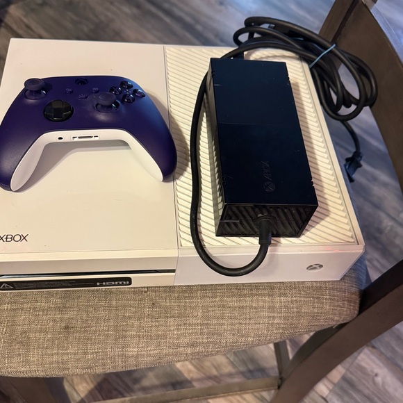 White and Black Console with Purple Controller